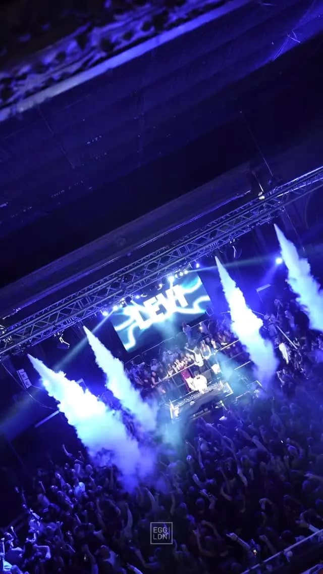 Energetic midweek dancefloor packed with ravers under pulsing house lights, capturing community spirit.