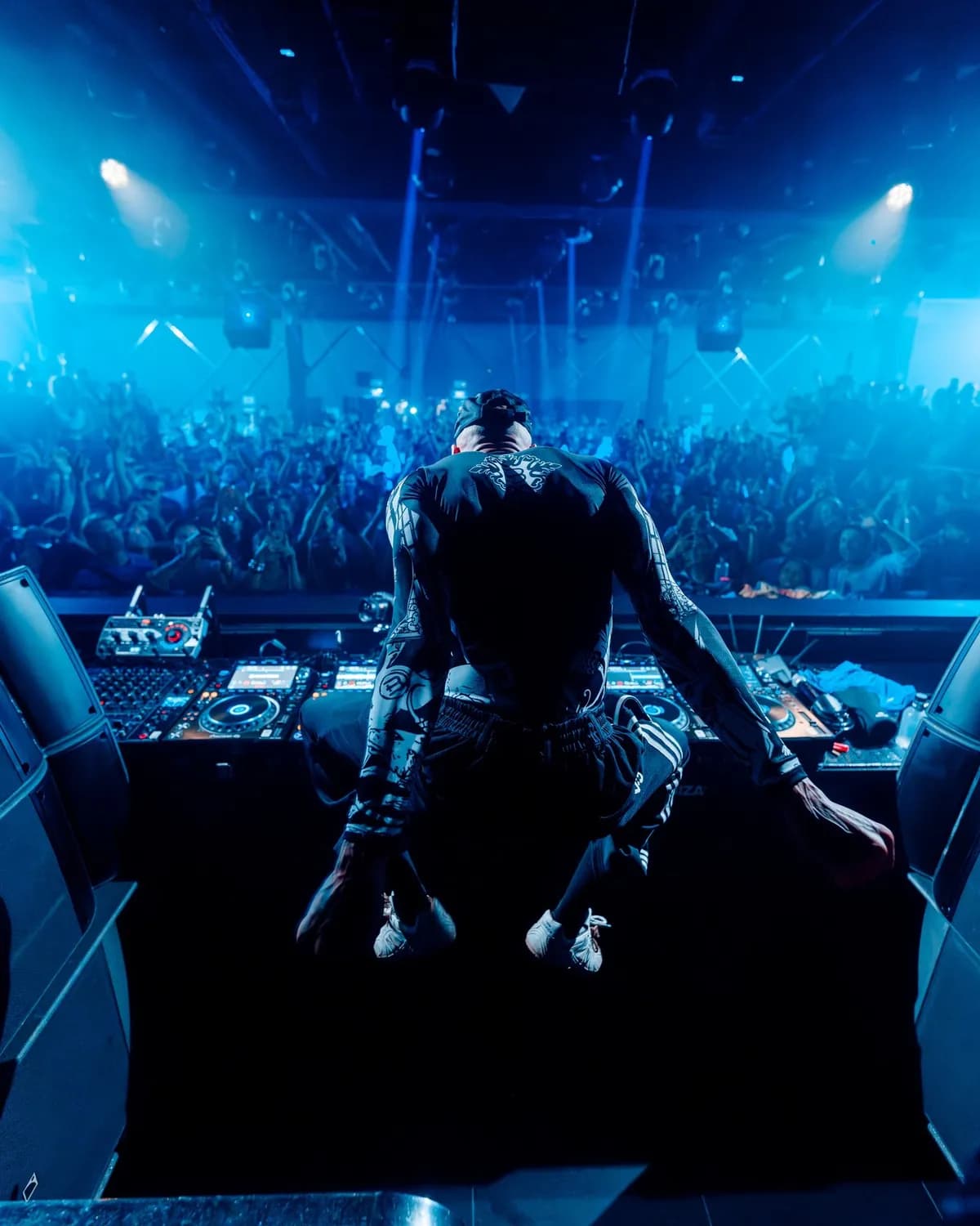 Hï Ibiza kicks off April 25th with pure house fire from Joseph Capriati, East End Dubs, and The Martinez Brothers under the glowing eye. Crowd surges with raised hands in spotlights, launching the summer house season.