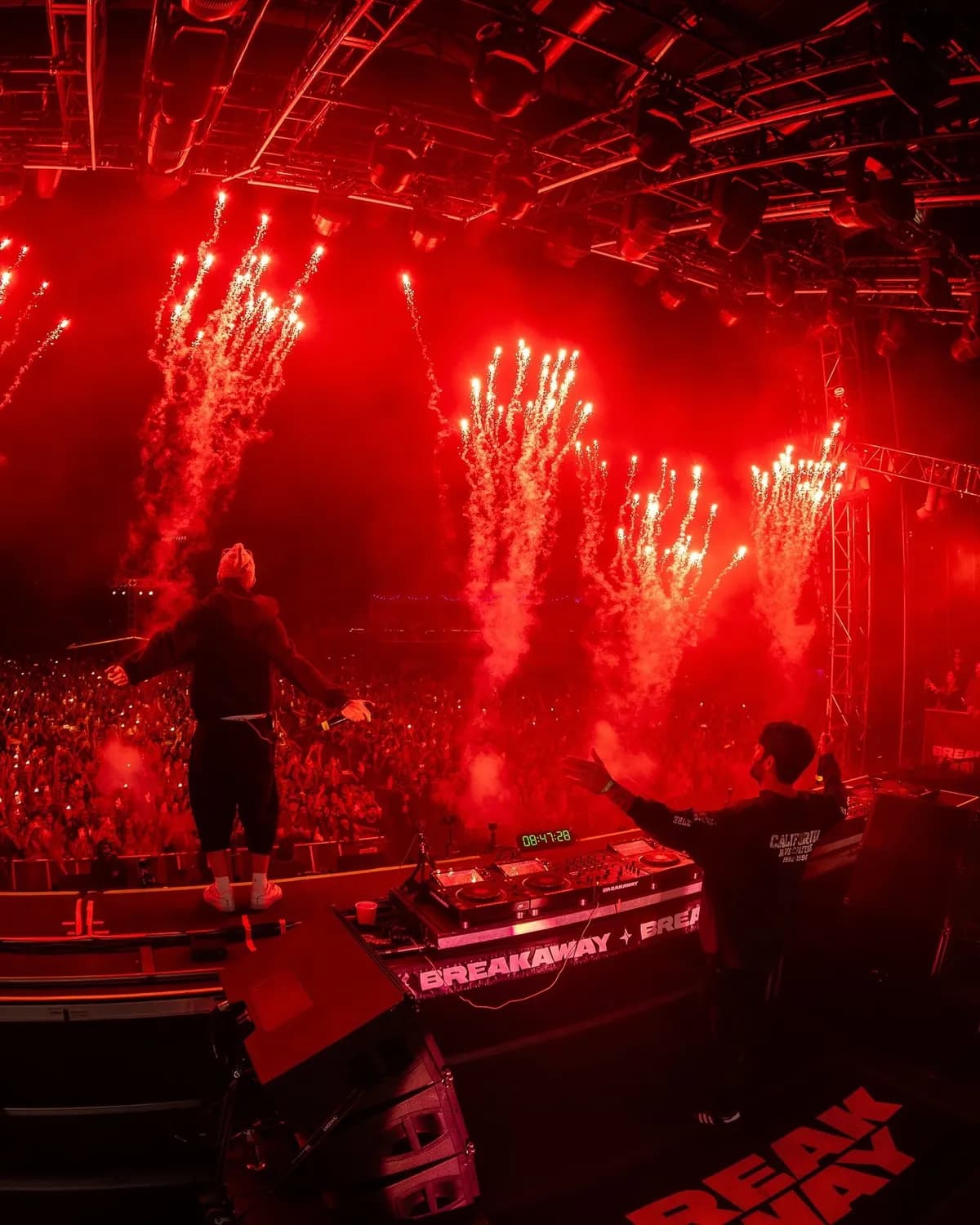 Sloan Park's towering LED pyramid pulses 50 feet high during golden hour April 24. Desert winds carry bass across the entire valley floor. Architecture owns the skyline.