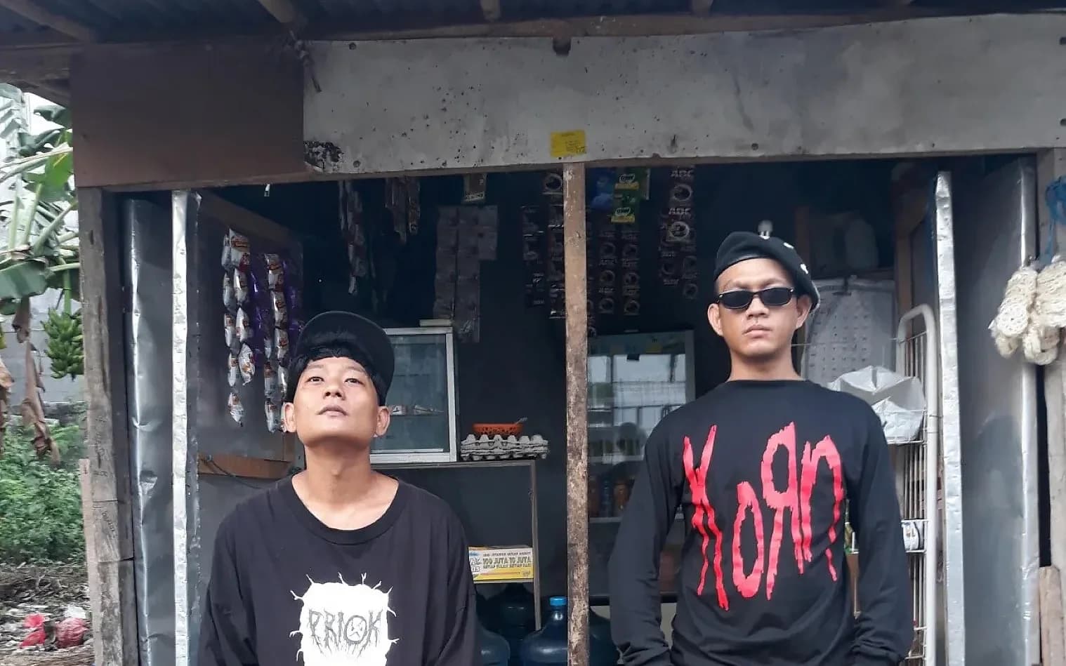 Kasimyn (left) and Ican Harem outside a shop in Bali, dressed in the streetwear-and-metal-merch look that carries onto their stage shows.
