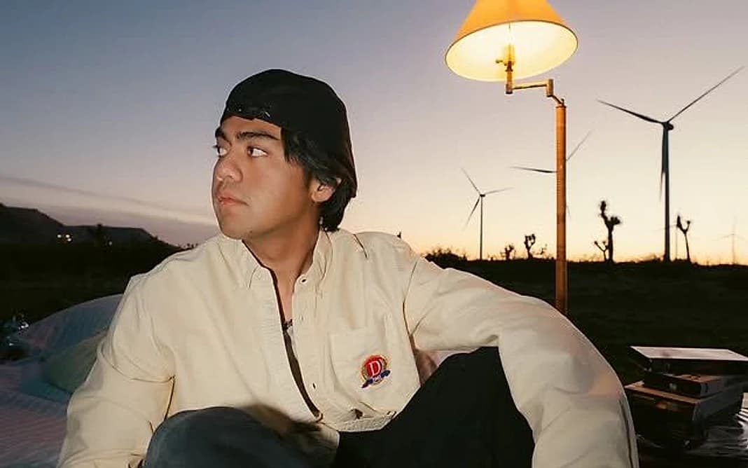 GUDFELLA (Kyle Domingo) in a 2026 press campaign photo.