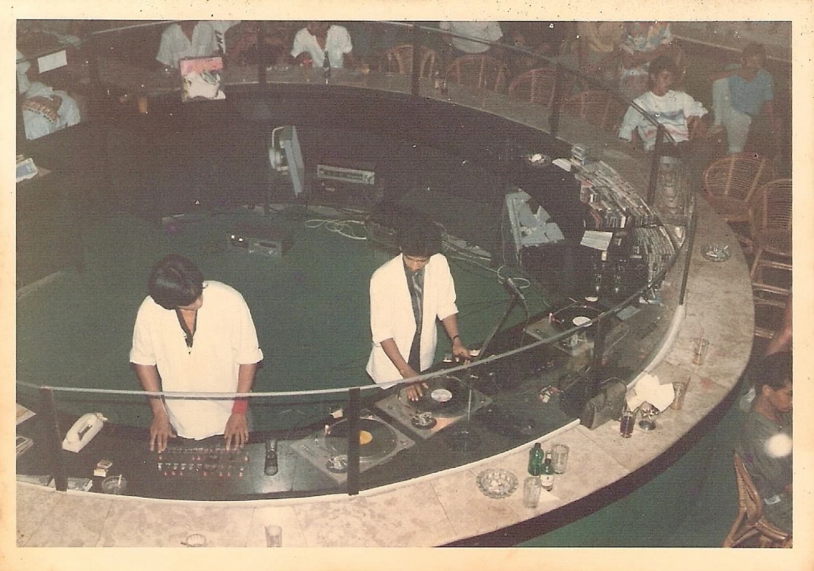 A Nusantara-era disco DJ party, circa 1980s, the same scene Munir has spent over a decade re-editing for modern sound systems.