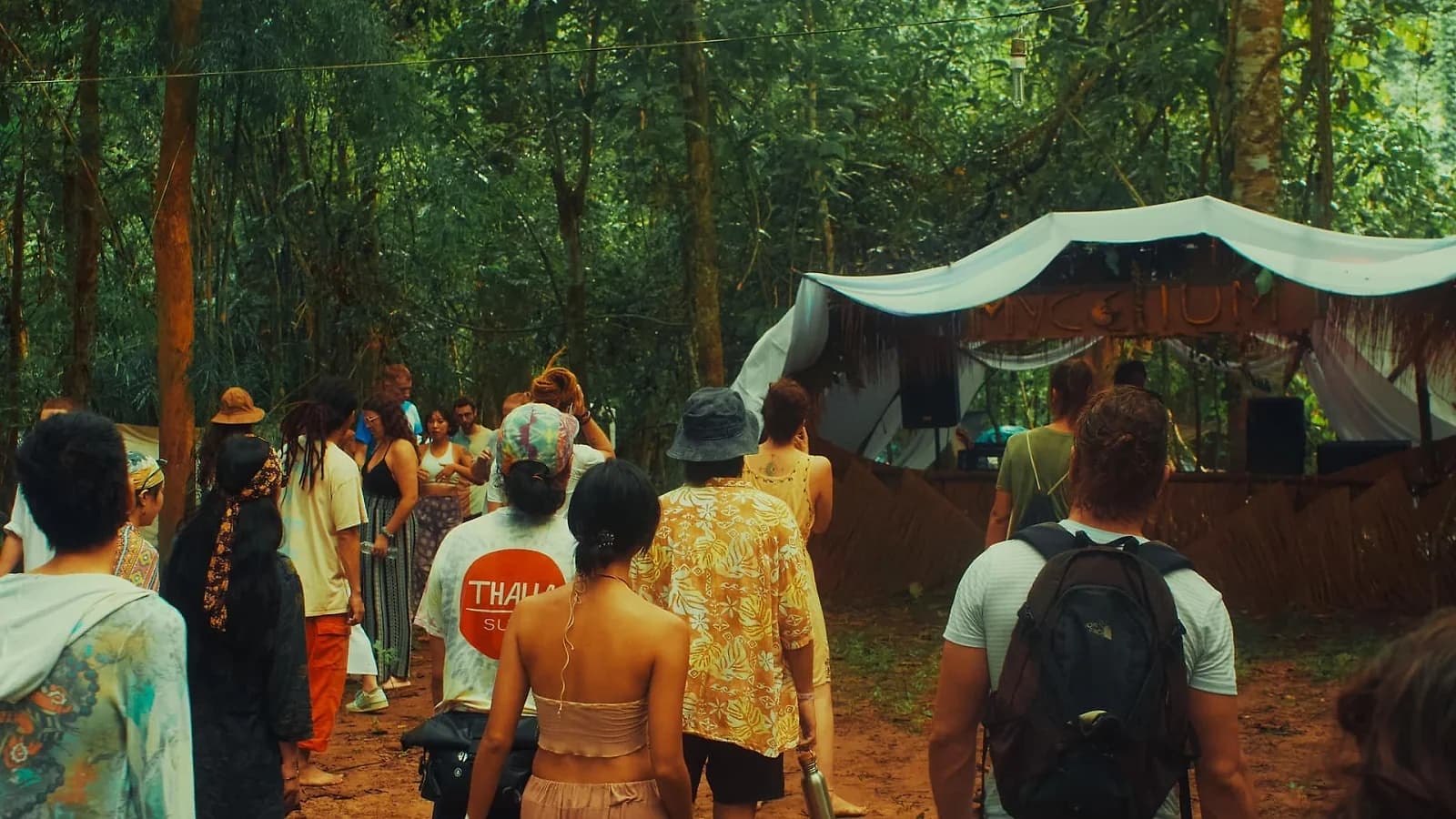 Festival-goers walk into Mycelium's jungle stage at Tiger Jungle Art Camp, Chiang Dao, November 2025.
