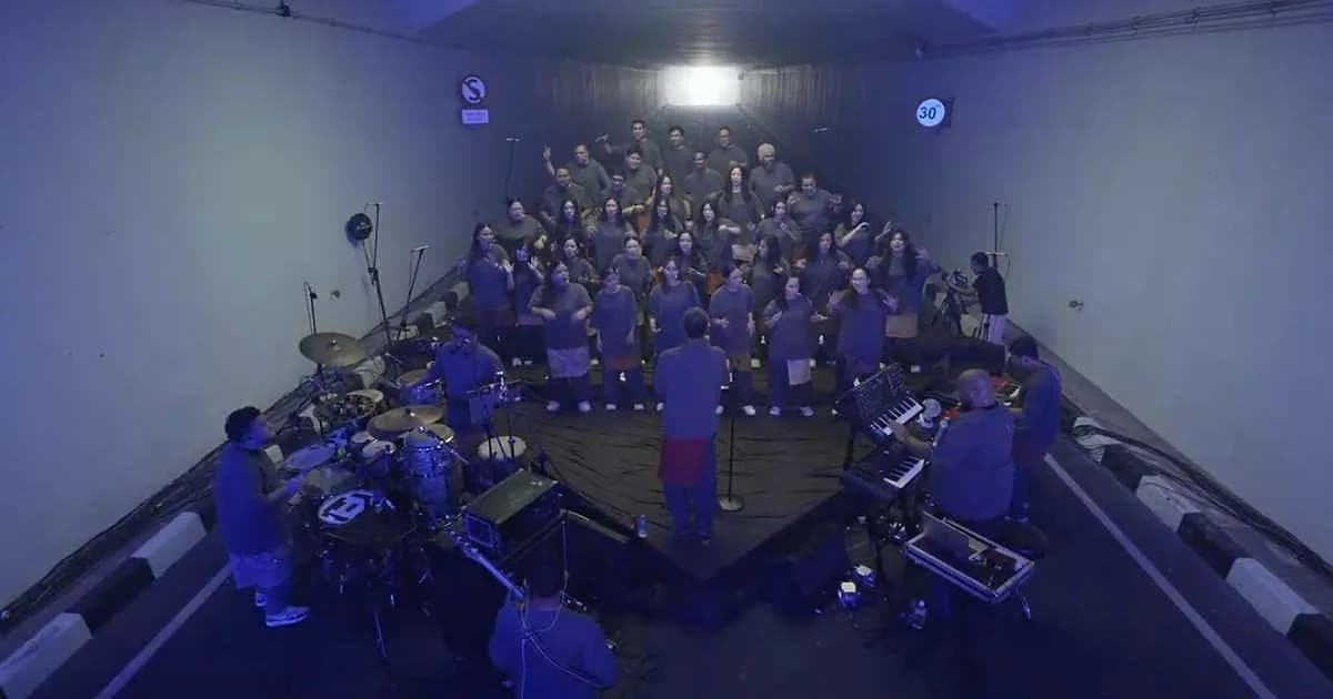 Tony Williams and a 35-member choir perform Tunnel Vision: An Ode to Ye inside a Jakarta pedestrian tunnel, October 18