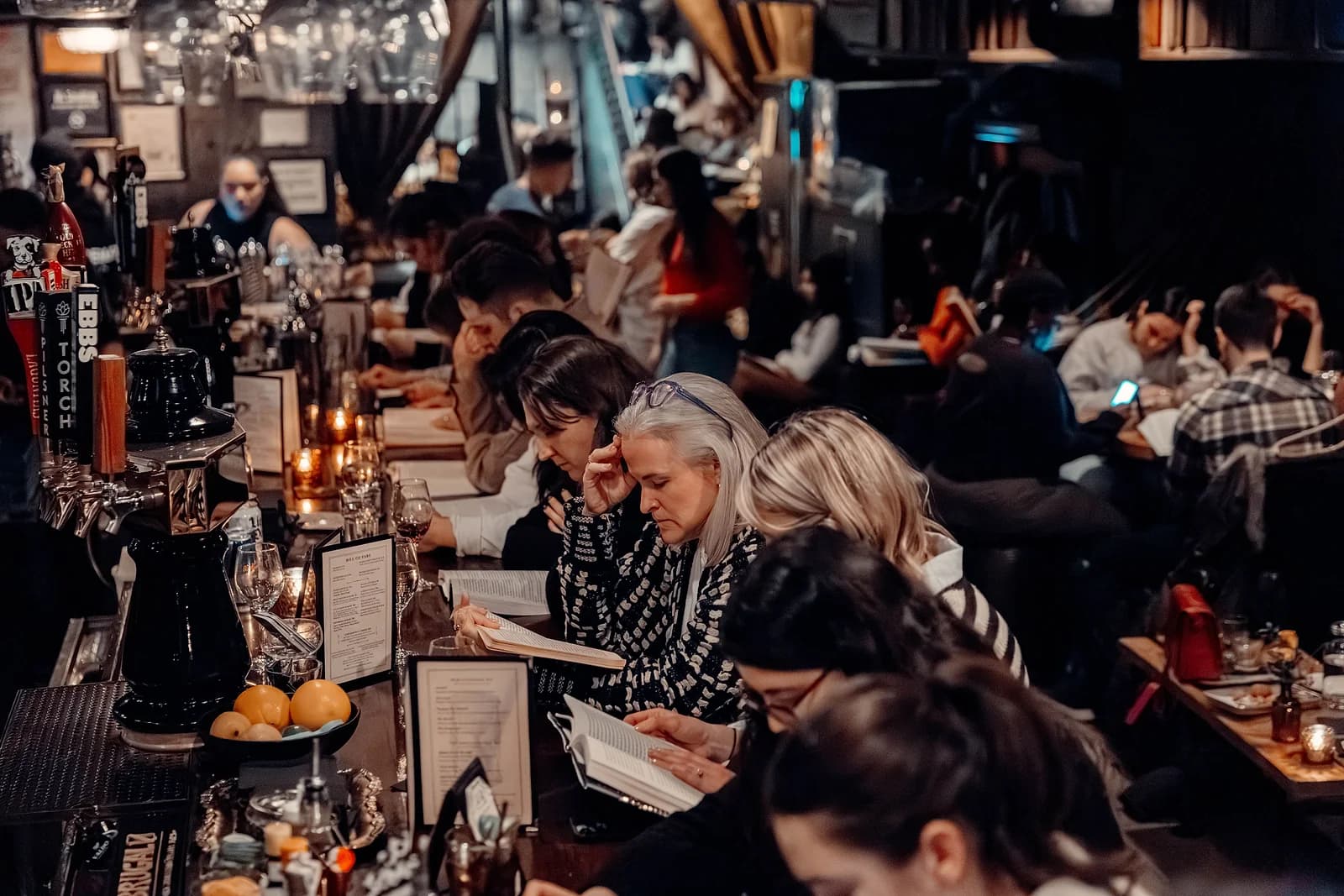 A Reading Rhythms silent-reading party in the US. The format has spread to more than 20 cities since 2023, but none of them are in Asia, which is what makes Undercity's version its own thing rather than a franchise.