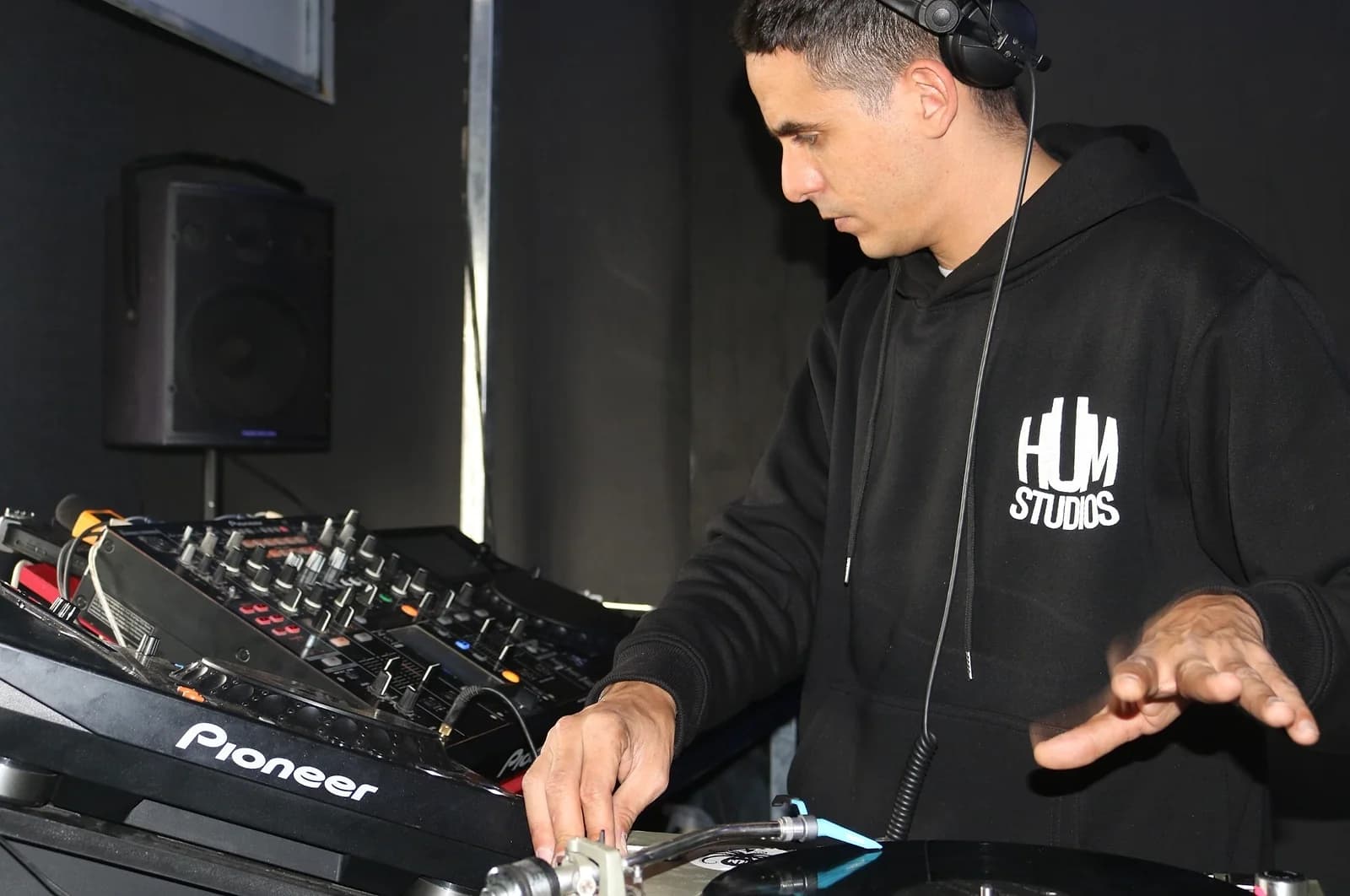 Yanes behind the decks at HUM Studios, the Hanoi production space and micro-club that's absorbed much of Savage's old crowd.