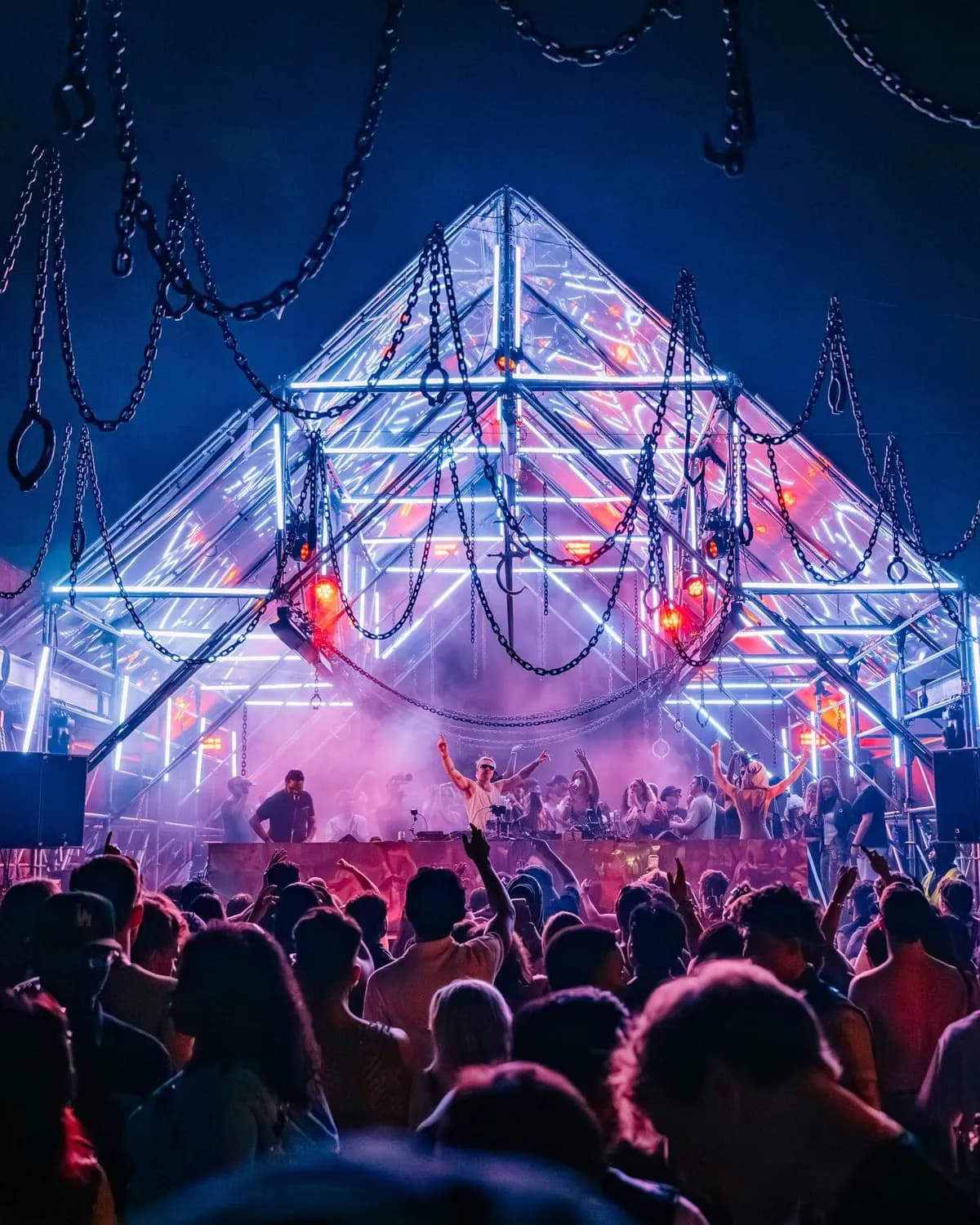 Miami Factory Town blends house rhythms with concrete edge. Dancers move wild under lights in pure club heaven.