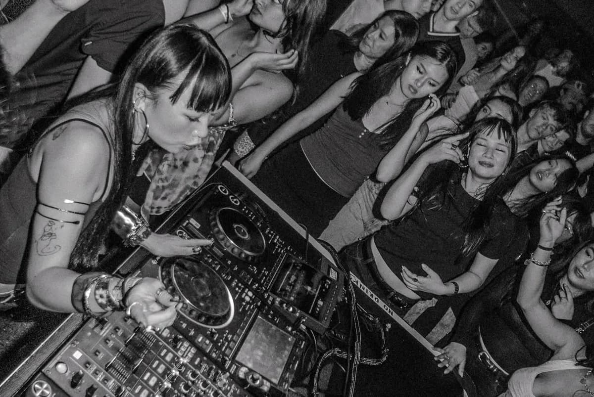 The crowds showing up for DJ Mandy in 2026 are not there for the content. They are there for the set.