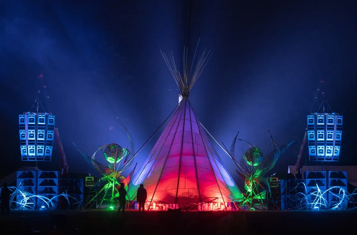 A single stage, a forest and a crowd that trusted the process. Since 2001.