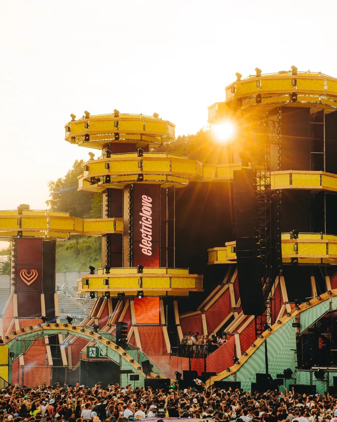 The mainstage at electric love. cutting edge technology, vibrant artistry, and the austrian alps behind it. Nothing else looks like this.