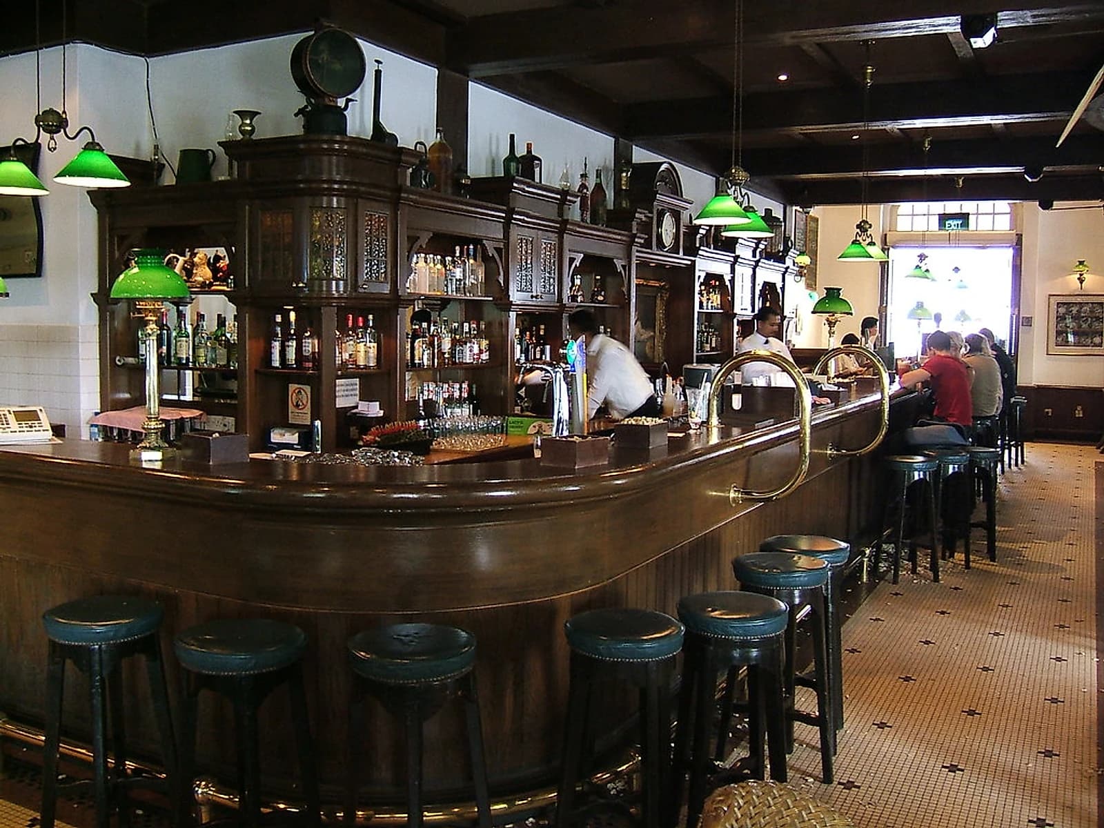 Singapore's Liquor Control Act doesn't touch what happens inside a licensed bar. It's the sidewalk outside, after 10.30pm, where the law kicks in.