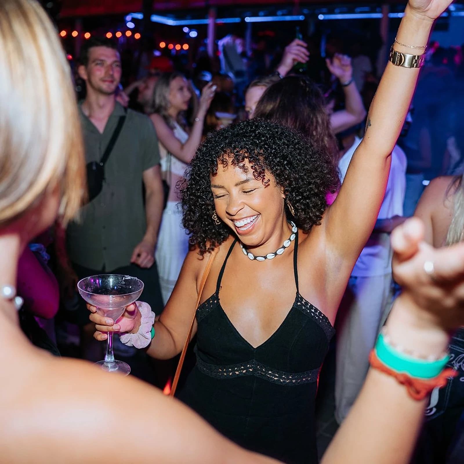 A packed dancefloor at Old Man's in Canggu, where the party rarely has a hard start time.