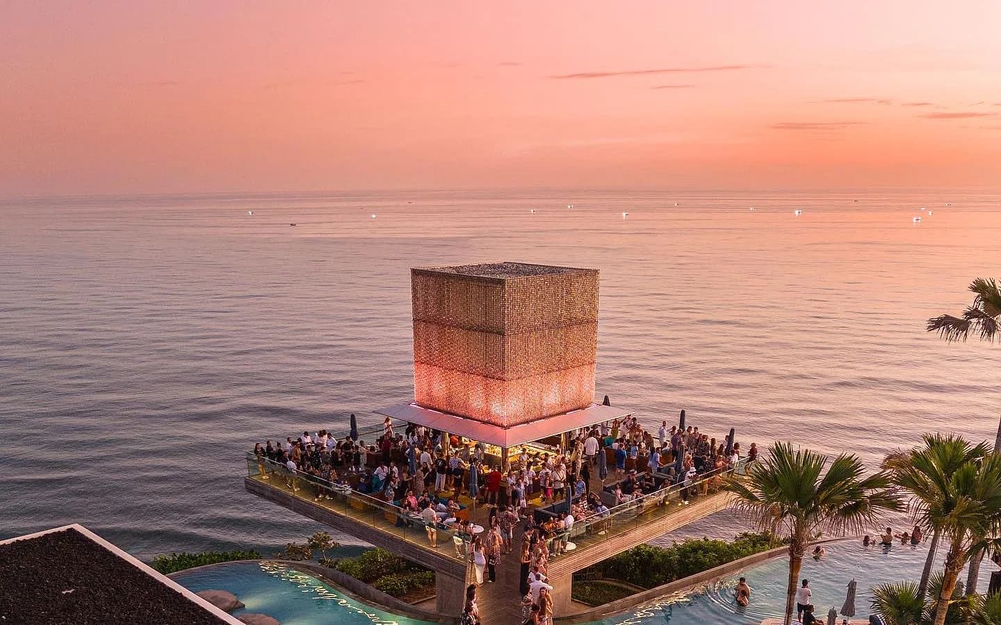 Savaya's Cube bar on the clifftop above Pecatu, Uluwatu, at sunset.
