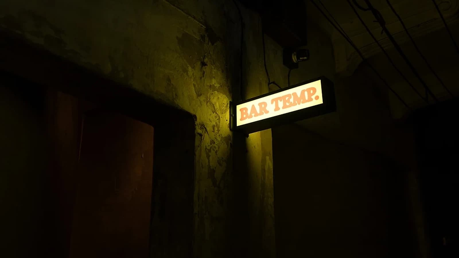 No street number, no clipboard, just a lit sign in a converted shophouse near Yaowarat. This is the entire admissions test at Bar Temp.