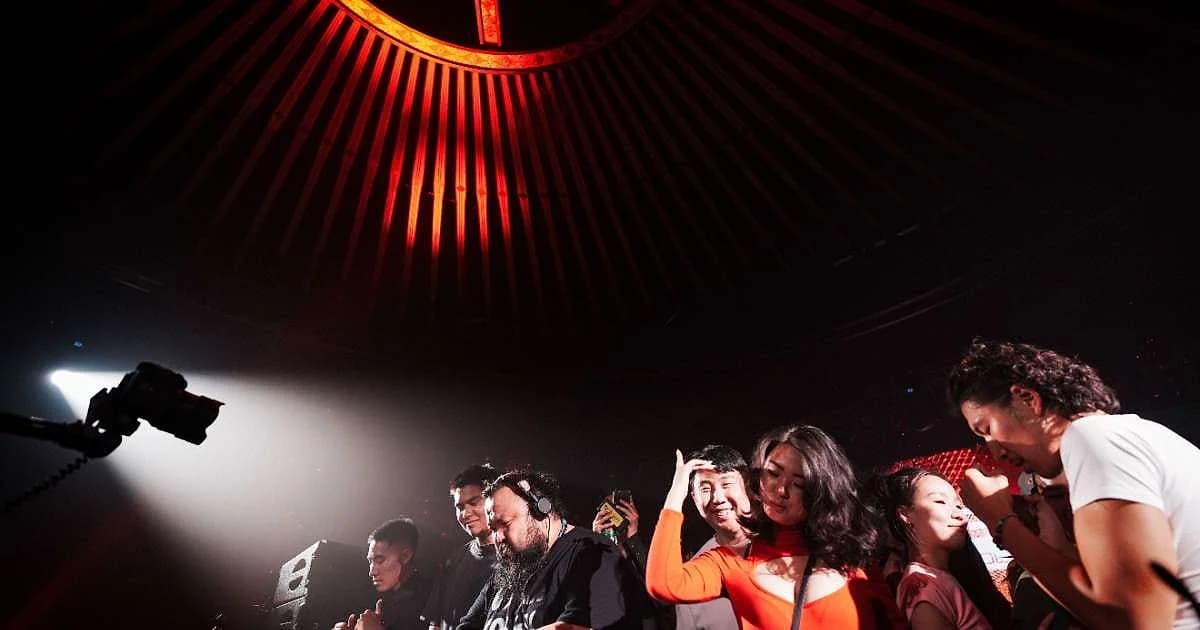 Biliguudei behind the decks at The Mixmag Lab Mongolia, under Ulaanbaatar's Blue Sky Tower dome.