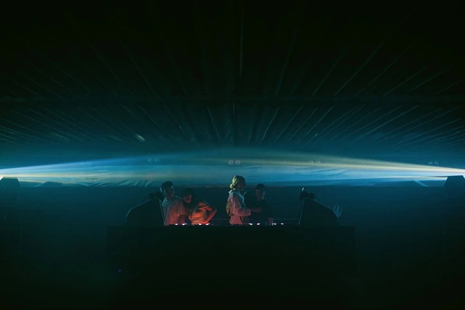 Unmute's DJ booth, built into the venue's four-way sound system on the Cuốn Club Room floor.