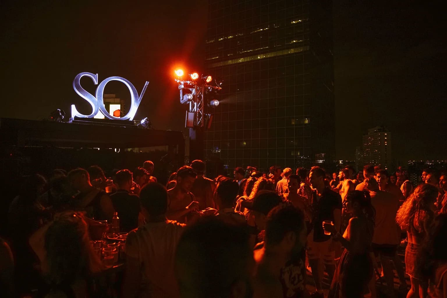 SO Pool Party's own signage lights up as the afternoon event turns into a nighttime dance floor.