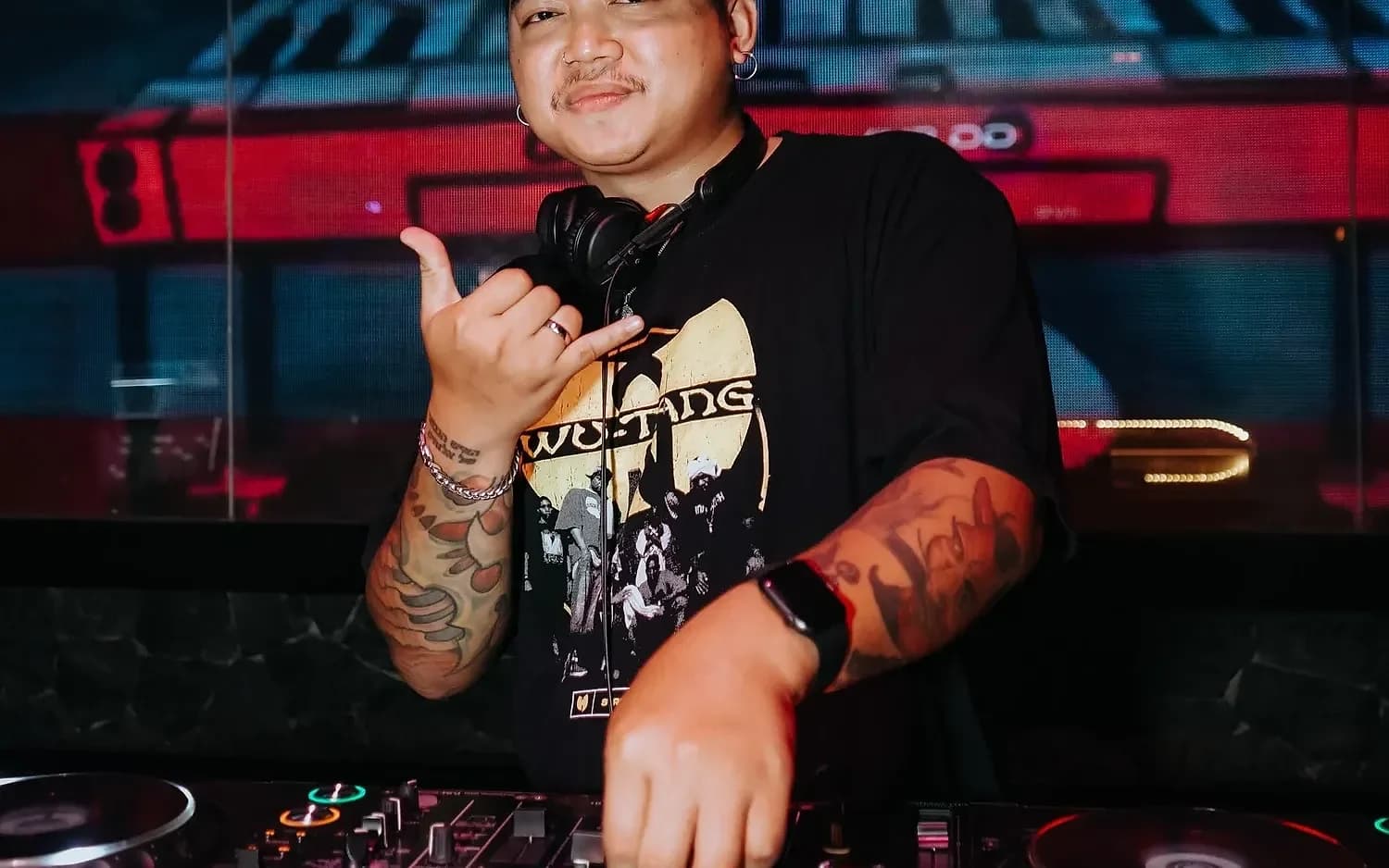 Resident DJ Blucks behind the decks at ShiShi's Main Club.